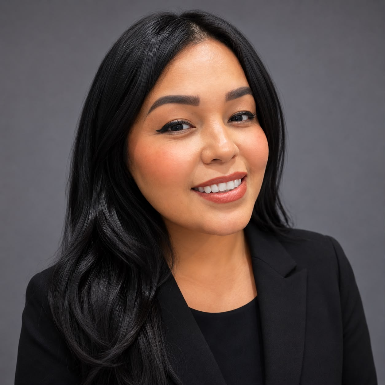 Portrait of Anel Castillo, Executive Campaign Strategist, in a dark blazer.